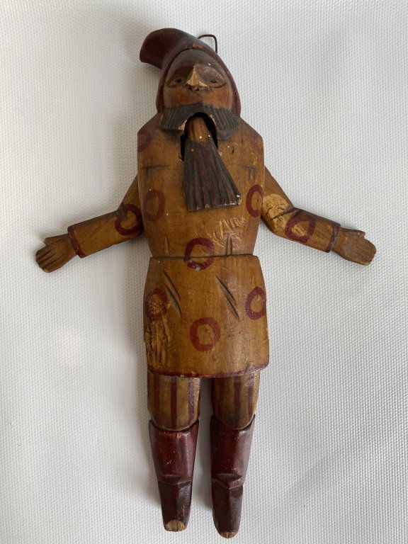 Early paint decorated wood jointed figure. (1 of 7)