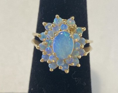 14K gold Opal ring. Ring is missing one stone. Approx (1 of 5)