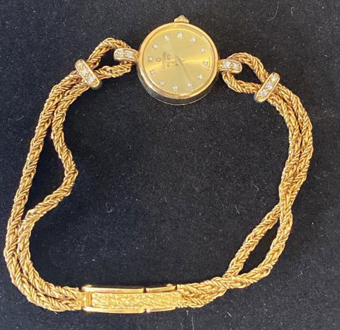 14K Concord watch, diamonds on dial. Diamonds on: Diamonds on bracelet. ; 14K yellow case and band.