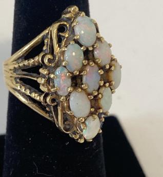 10K yellow Gold Ladies Ring. Features 9 oval Opals of (1 of 4)