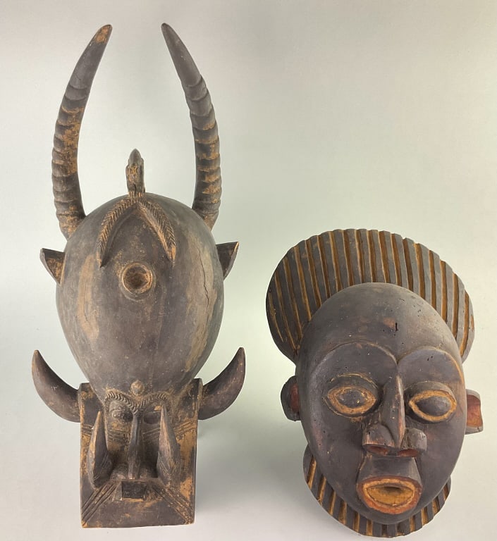 African Bamoun Mask & Senufo Kponyungo Helmet.: Largest: 24"Hx9"W. 1st: Baule Goli society Kplekple mask from the Cote d'lvoire region of West Africa. 2nd: Bamoun mask from Congo Zaire in central Africa. Condition: Good with minor wear.**LOCAL PICK