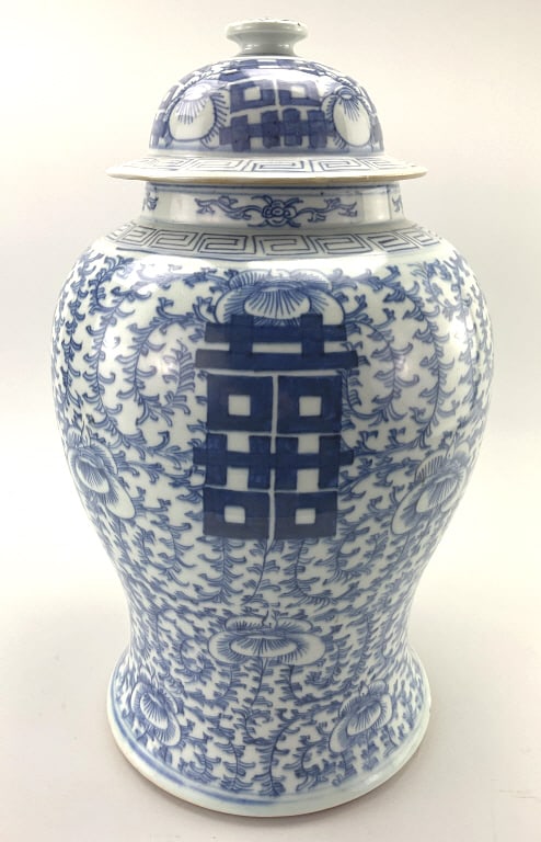 Chinese Blue & White Porcelain Ginger Jar.: 17"Hx9"W. Unsigned, late19th/early20th century. Chinoiserie style with bulbous body and domed lid. The decoration includes hand-painted floral and foliate motifs with double happiness symbol, which is