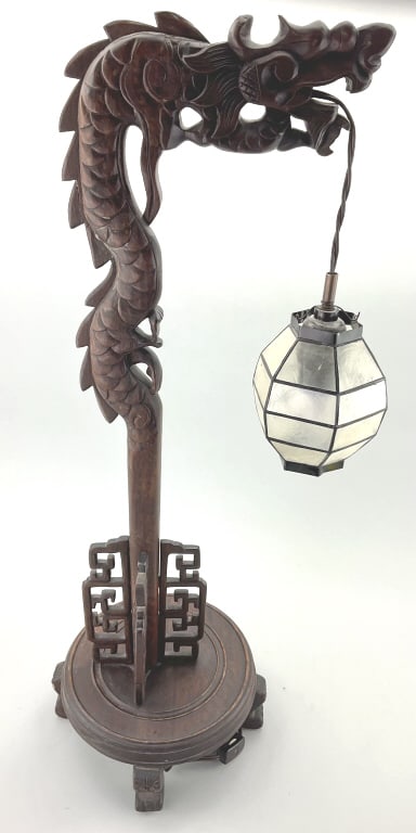 Chinese Hand Carved Mahogany Dragon Lamp.: 28"Hx10"W. In working condition. Antique/Vintage table lamp with dragon standard, circular footed platform base and paneled lantern-form mica shade. Condition: Good with and old break repair.**LOCAL P