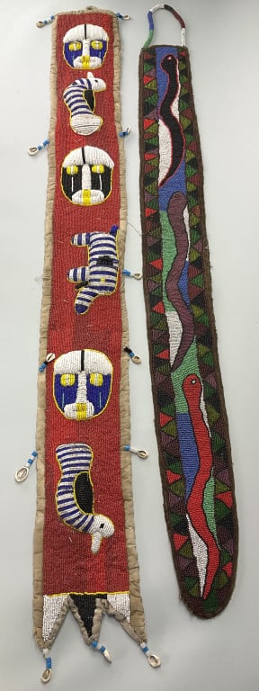 2 African Yoruba Beaded Diviner Sashes.: 47"Lx5.5"W. West Africa, Nigeria, Yoruba culture, circa early to mid-20th century. Two ornate sashes made from cotton cloth and covered with thousands of glass seed beads and cowrie shells to form col