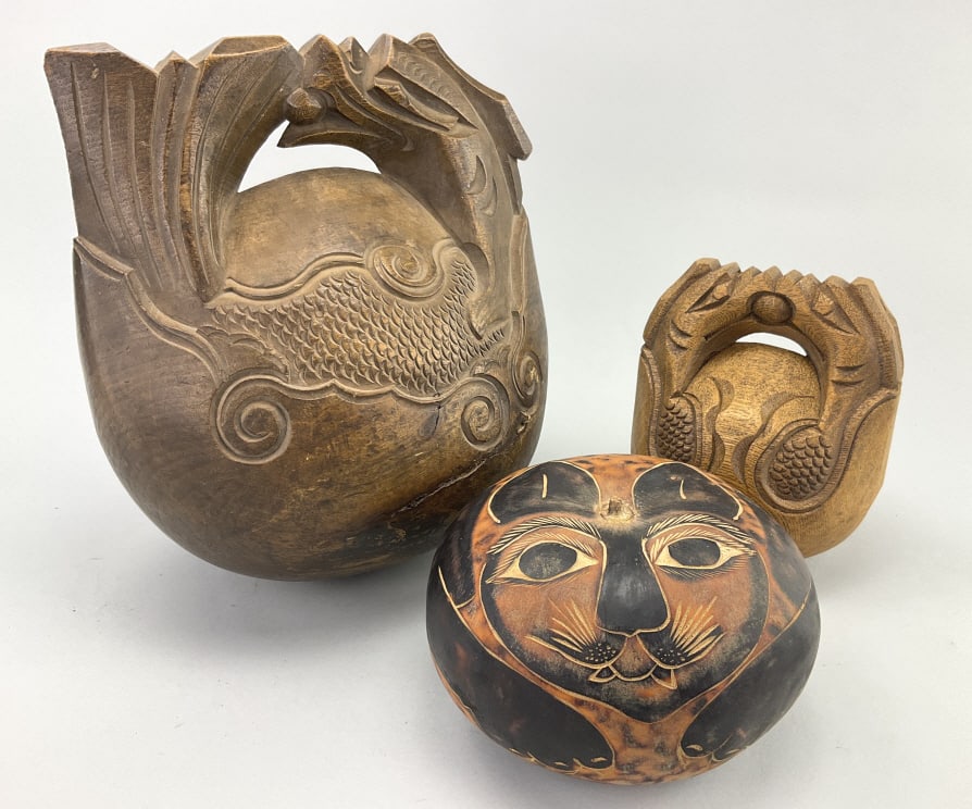 Buddhist Percussion Instruments & Cat Face Gourd.: Largest: 11"Hx9"W. Mokugyo percussion instrument used in East Asian Buddhist and Taoist ceremonies. Also known as a wooden fish, Chinese temple block, or mutu. The mokugyo is struck with a padded mall