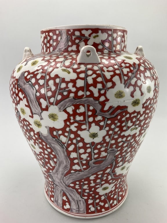 Chinese Red Prunus Blossom Porcelain Vase.: Measures 13 inches high x 9 inches at its widest point. Unsigned Chinese coral red ground prunus blossom temple vase. Condition: Very good. **LOCAL PICKUP MUST BE BY APPT ONLY POSTAUCTION ONLY ON SPEC