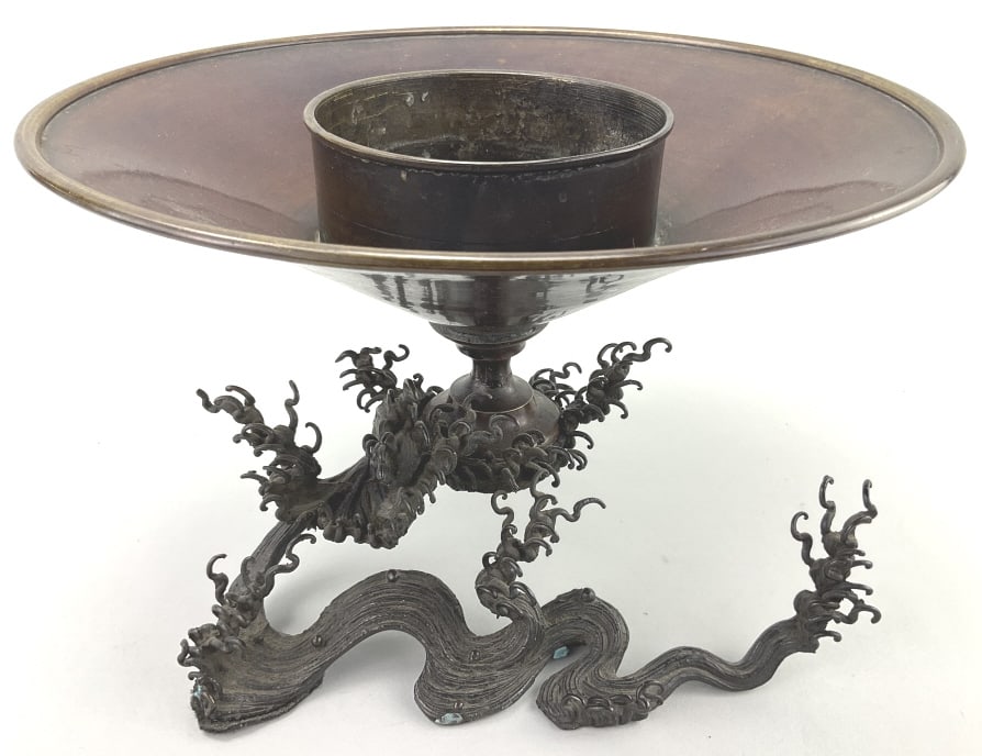 Japanese Bronze Meiji Period Usubata Vase.: Measures 8 inches high by approximately 12 inches wide. Circa 1926-1912. Finely sculptured crashing waves base. These vases were specifically designed for the Japanese art of flower arrangement known 