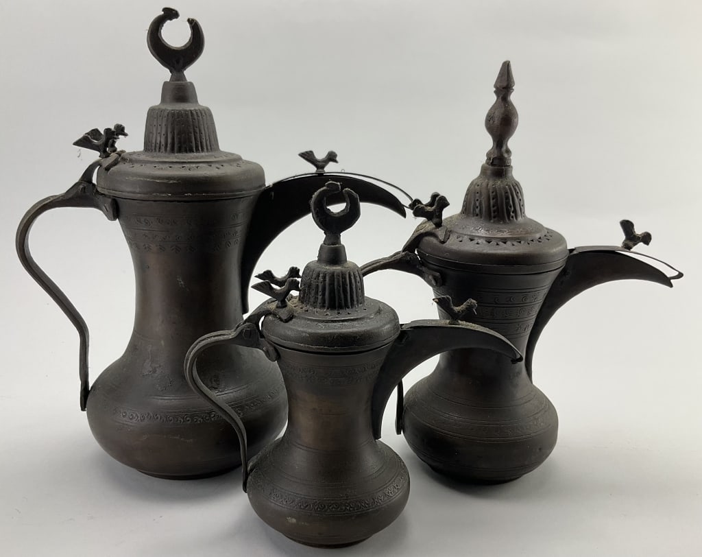 3 Antique Copper Dallah Bedouin Coffee Pots.: Measure 8.5-12 inches high. Type of pot used for centuries to brew and serve Qahwa, a traditional spicy and bitter coffee, common in the Arabian Peninsula, and among the Bedouins. Embossed banded copp