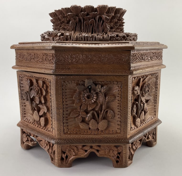 Vintage Hand-Carved Rosewood Jewelry Box.: Measures approximately 11 inches high by 12 inches wide. Finely carved rosewood high-relief floral and foliate octagonal form hinged lid box, red velvet lining with compartmented lift-out upper tray. 