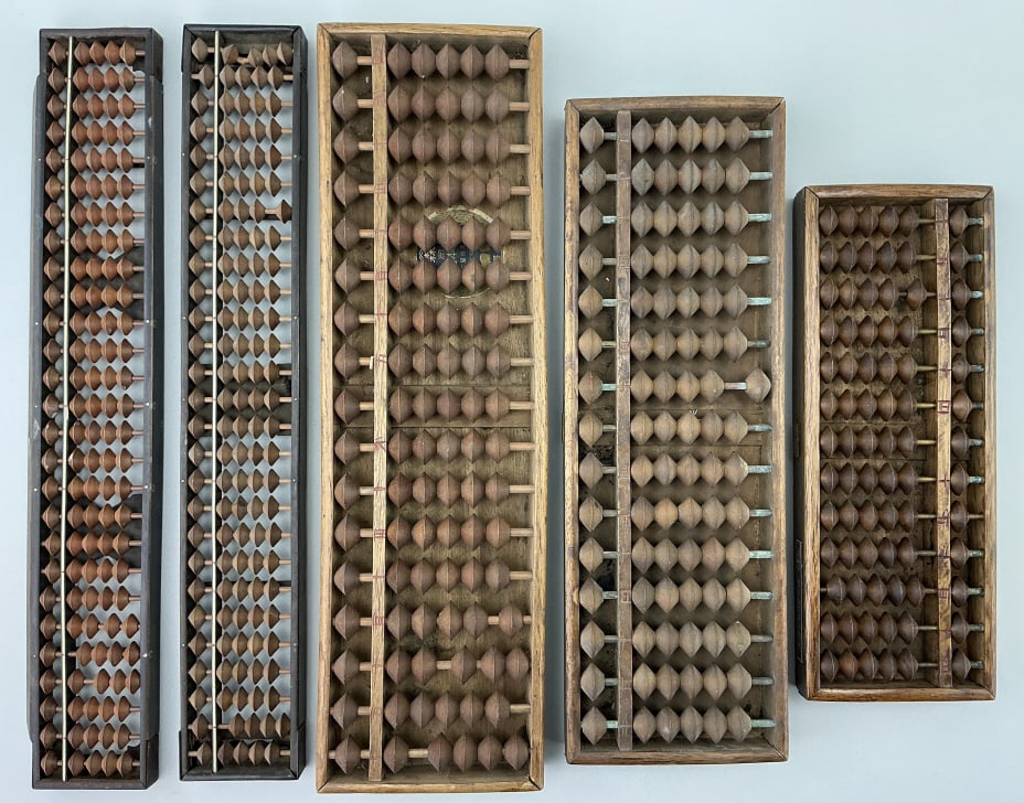 5 Japanese Meiji Period Rosewood Abacuses.: Longest abacus measures 15 inches long. One signed on base with plaque translating to 30th Anniversary Commemoration of Establishment. Known as soroban, traditional mathematical calculating instrument