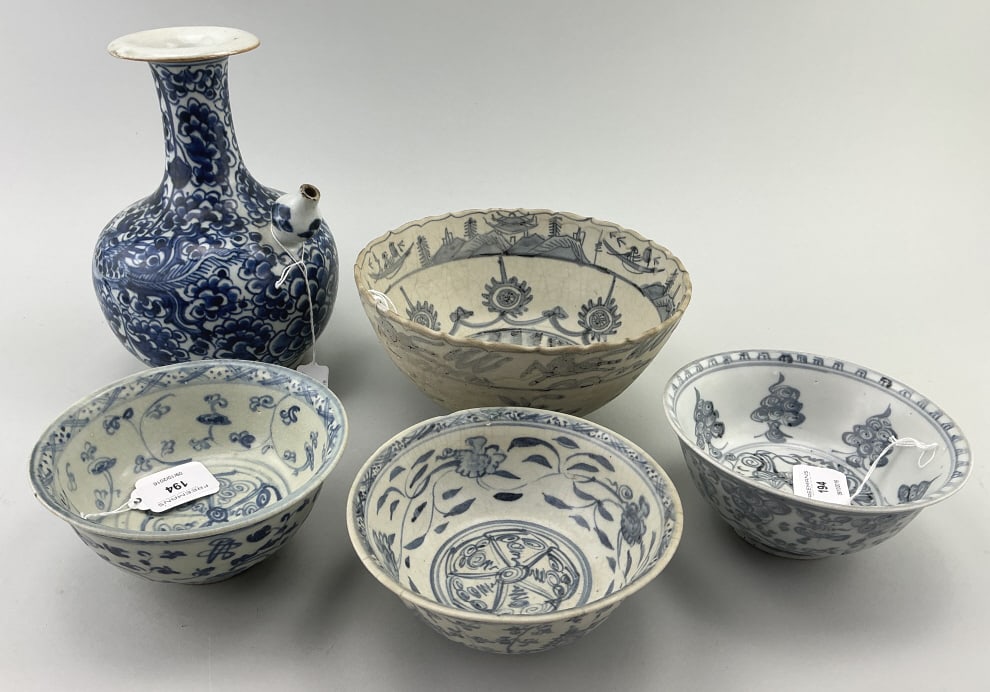 Chinese Blue & White Porcelain Kendi & 4 Bowls.: Ewer measures 9 inches high. All pieces appear to be 18th or 19th century. Chinese pouring vessel (kendi) with phoenix bird and lotus motif. 4 various bowls with floral motifs. Condition: Good, bowls 