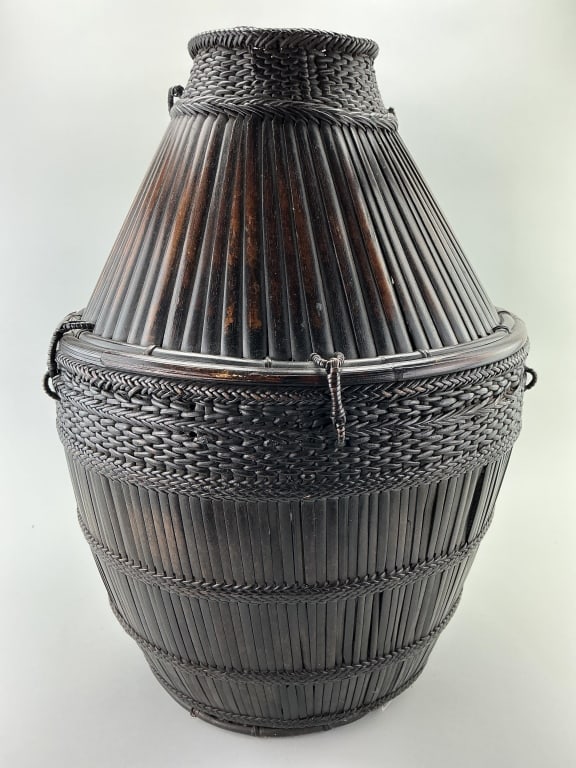 Antique Ifugao Tribe, Philippines Locust Basket.: Measures 21 inches high. Also known as butit or alat. Woven from split bamboo and rattan. Used by the Ifugao people in Northern Luzon to store live locusts before consumption. Condition: Good with lig