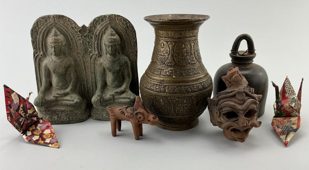Terra Cotta Figures, Nepalese & Buddhist Wares.: Bronze vase measures 6 inches high. Pair of vintage Chinese silk embroidered shoes, various terra-cotta figures, brass ceremonial vase, and bronze bell. Condition: good with use wear.**LOCAL PICKUP MU