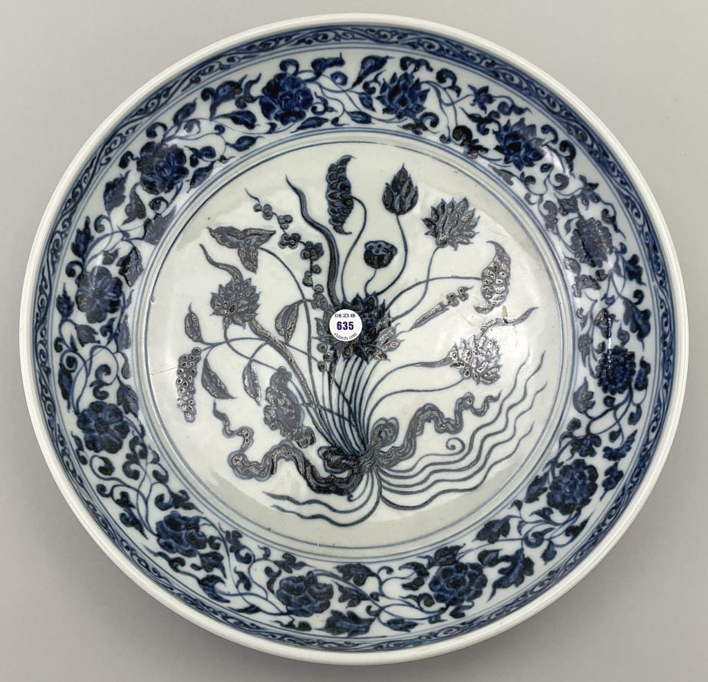 Antique Chinese Blue & White Porcelain Dish.: Measures 13 inches diameter x 2.5 inches high. Likely Meiji period (1868-1912). With central pond, leaf, and lotus seed pod decoration surrounded by scrolling lotus flower decoration. This style of sh