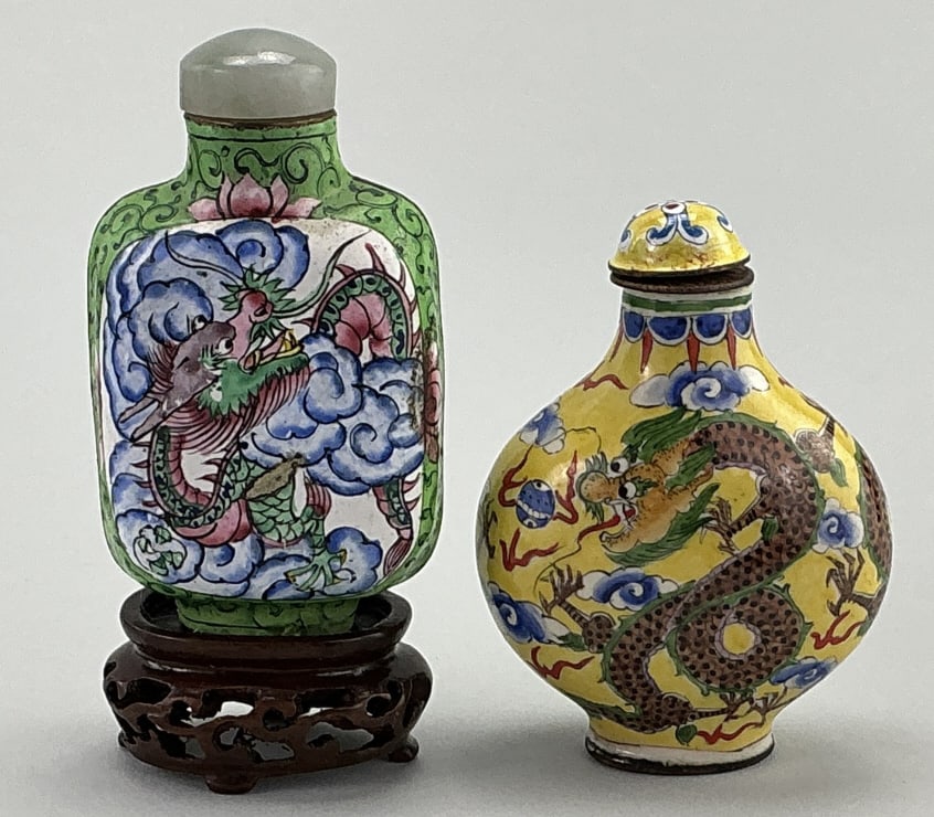 2 Chinese Qing Dynasty Enamel Snuff Bottles.: Measure 2.5 inches without the wooden stand. Both with dragon in clouds polychrome decoration. Yellow ground bottle has four-character Qianlong mark (1736-1795). Condition: Very good.**LOCAL PICKUP MU