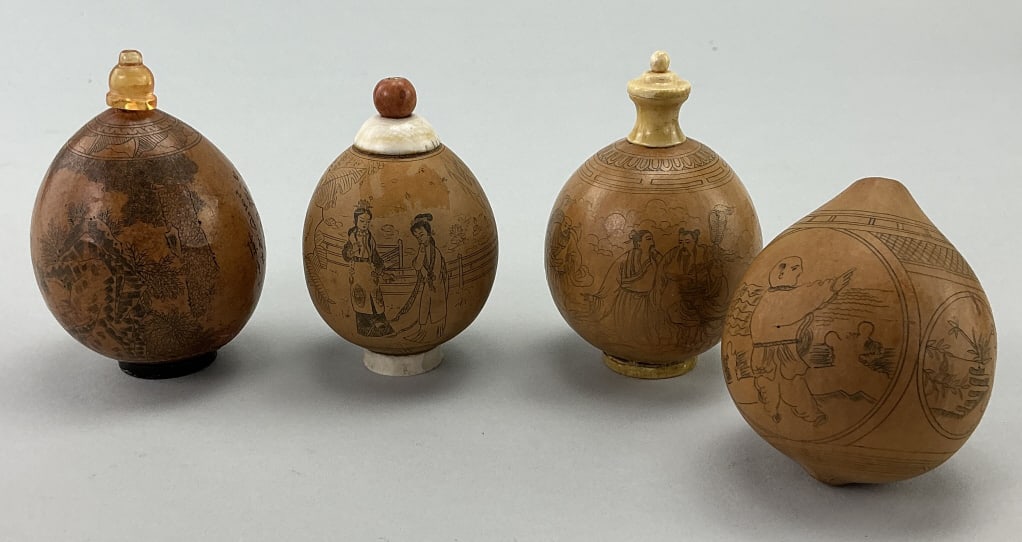 3 Chinese Etched Gourd Snuff Bottles & Rattle.: All measure 3 inches high. Three vintage snuff bottles and a seed-filled rattled, all hand-incised with Chinese figural and rural scenes. Condition: Very good with minor wear. **LOCAL PICKUP MUST BE B