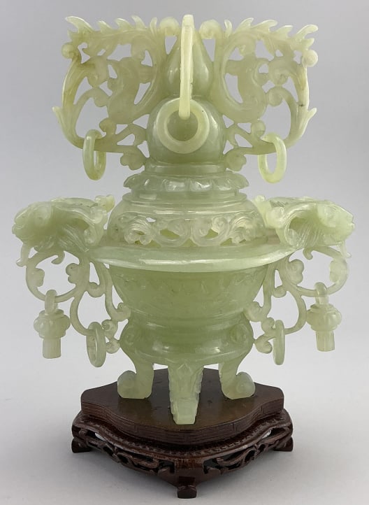 Japanese Showa Period Kouro Jade Censer.: Measures 9.5 inches high. Kouro jade, ornately carved with foo dog and drop-tassel handles, on a wooden stand. Condition: Very good. **LOCAL PICKUP MUST BE BY APPT ONLY POSTAUCTION ONLY ON SPECIFIC DA