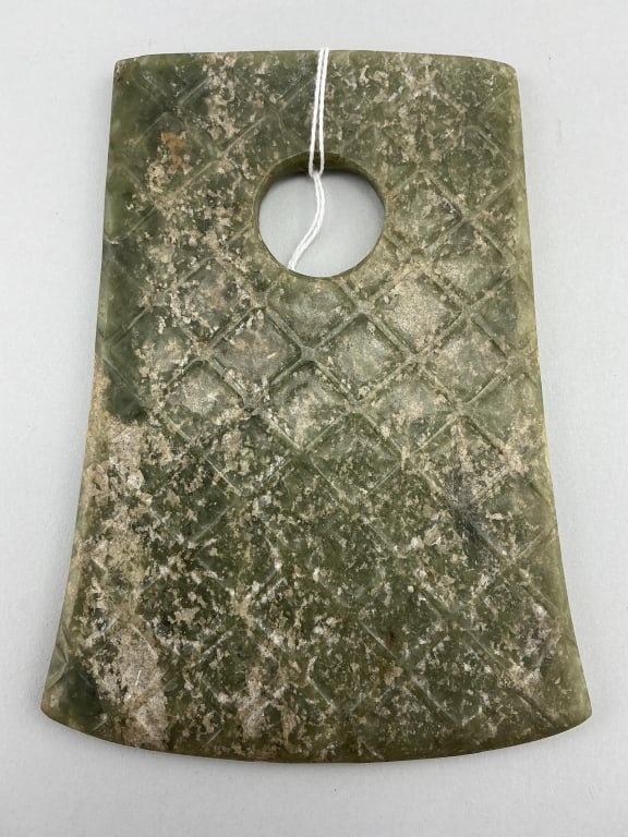 Neolithic Chinese Jade Ceremonial Axe Head.: Measures 5.5 inches long. With carved crosshatch design. Condition: Good with calcifications. **LOCAL PICKUP MUST BE BY APPT ONLY POST AUCTION ONLY ON SPECIFIC DATES:CALL 717-272-7078 TO MAKE AN APPOI