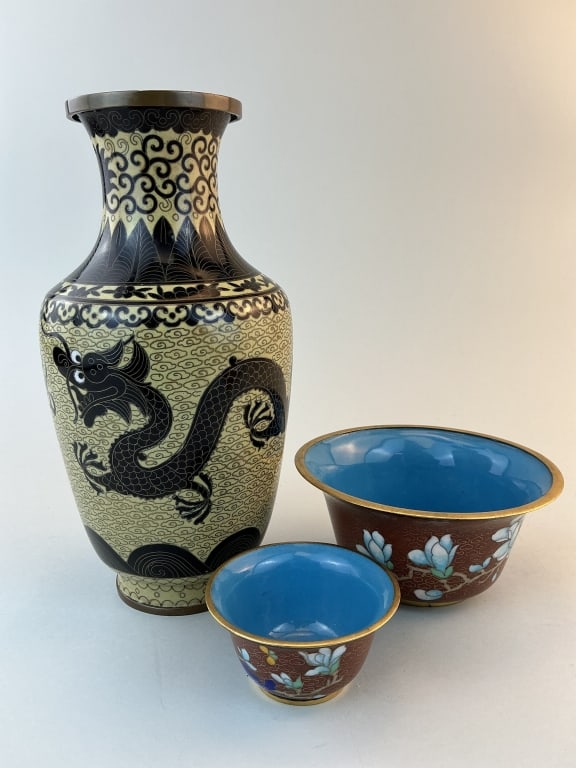 Chinese Cloisonné Dragon Vase & 2 Bowls.: Measures 9 inches high. Baluster vase with black 5-claw dragon pursuing a flaming pearl on a yellow ground, the ground enlivened by copper wire clouds, with ruyi, floral and lappet borders above and r