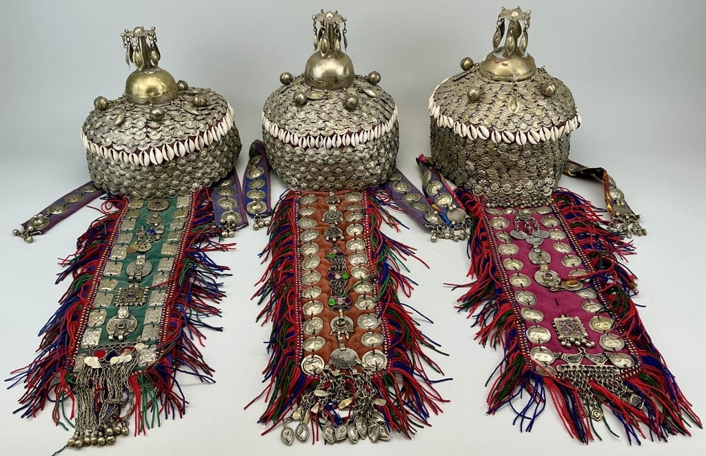 3 Central Asian Turkmen Wedding Headdresses.: Sash portion measures 21 inches long. 3 Turkestan ceremonial headdresses adorned with cowrie shells, kuchi coin pendants on embroidered fabric. Condition: Good with light wear.**LOCAL PICKUP MUST BE B