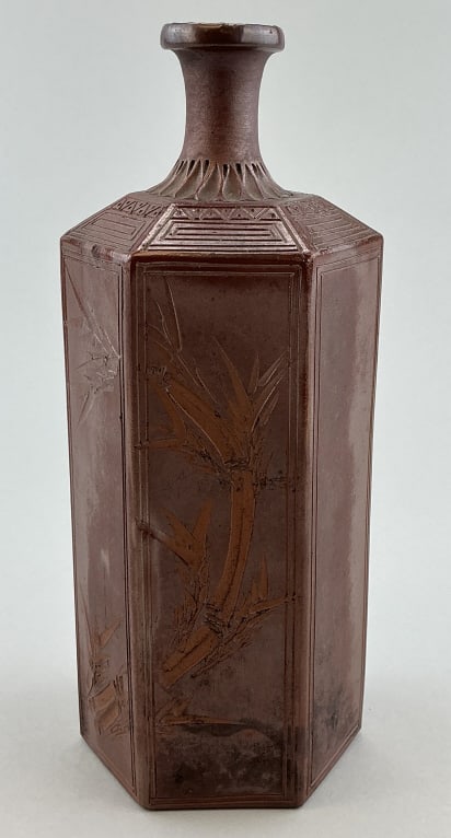 Antique Japanese Ko Bizen Pottery Bottle Vase.: Measures 8 inches high. Likely crafted as a tokkuri (sake flask) during the Edo period (1603-1868). High-fired unglazed earthenware resulting in earthy reddish-brown tone. Hexagonal body with raise-ca