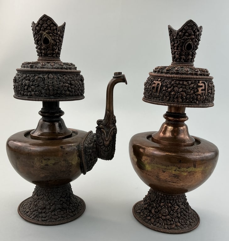 Antique Tibetan Buddhist Bhumpa Ritual Water Set.: Measure 10.5 inches high. 19th/early 20th century. Hand-crafted with ornate repousse work, including the tso bum (ewer/main vase) with the head of Makara at base of spout, which stays on the alter, an