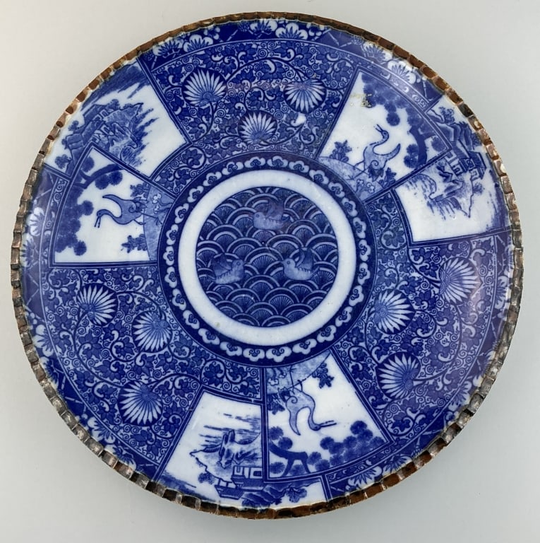 Antique Japanese Igezara Porcelain Charger.: Measures 13.5 inches in diameter. Likely Meiji period (1868-1912) Blue and white Sometsuke porcelain charger frequently produced in the Imari and Seto regions. Decorated with cranes, landscapes and fo