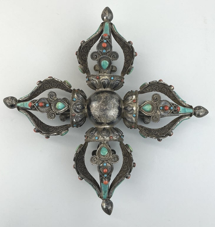 Tibetan Buddhist Silver Double Dorje Vajra.: Measures 11 x 11 inches. Also known as Vishwa Vajra, silver with filigree and set with turquoise, coral and lapis lazuli. A sacred ritual instrument representing absolute stability, indestructible wis