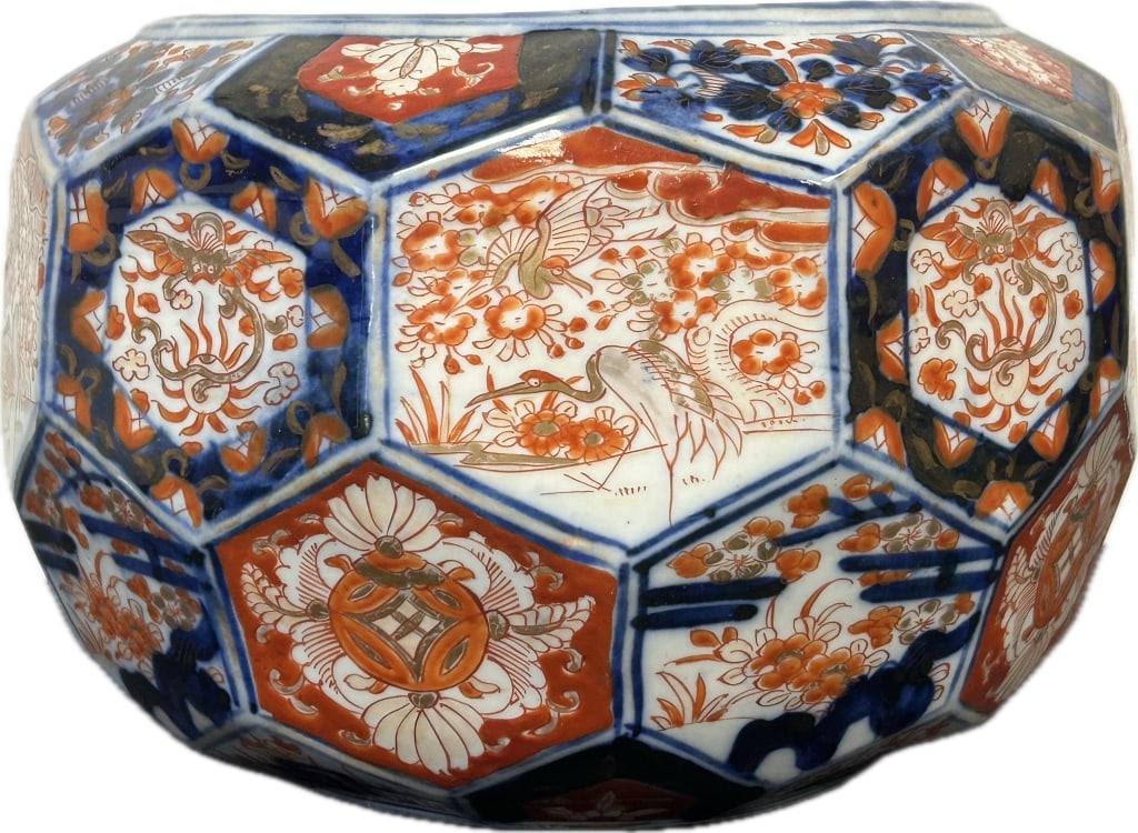 Antique Japanese Imari Porcelain Faceted Bowl.: 11.5 inch diameter x 7 inches high. Meiji Period (1868-1912) Arita porcelain bowl or jardiniere with honeycomb panels polychrome decorated with cranes, dragons chasing flaming pearls, floral and folia