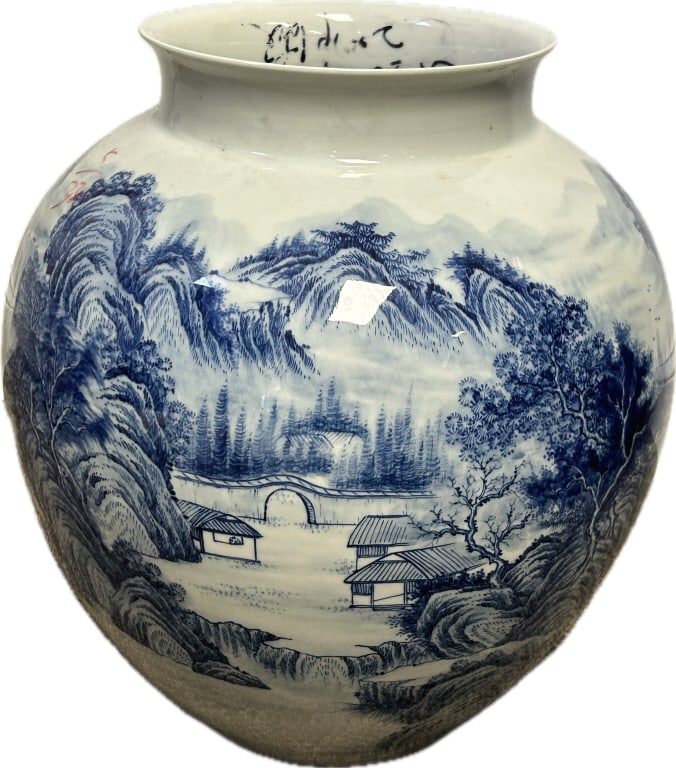Japanese Blue & White Arita Landscape Vase.: 13.5 inches wide x 15.5 inches tall. Signed on shoulder, Arita ware, Meiji period (1868-1912). Shanshui (mountain-water) decorated porcelain bulbous vase. Condition: Very good.**LOCAL PICKUP MUST BE B
