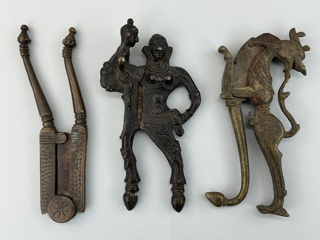 3 Antique Indian Brass & Iron Betel Nut Cutters.: Measure 6.5 inches long. Including Supari Leaf mother with child and Yali (dragon-like creature forms. Good with use wear. **LOCAL PICKUP MUST BE BY APPT ONLY POST AUCTION ONLY ON SPECIFIC DATES:CALL 