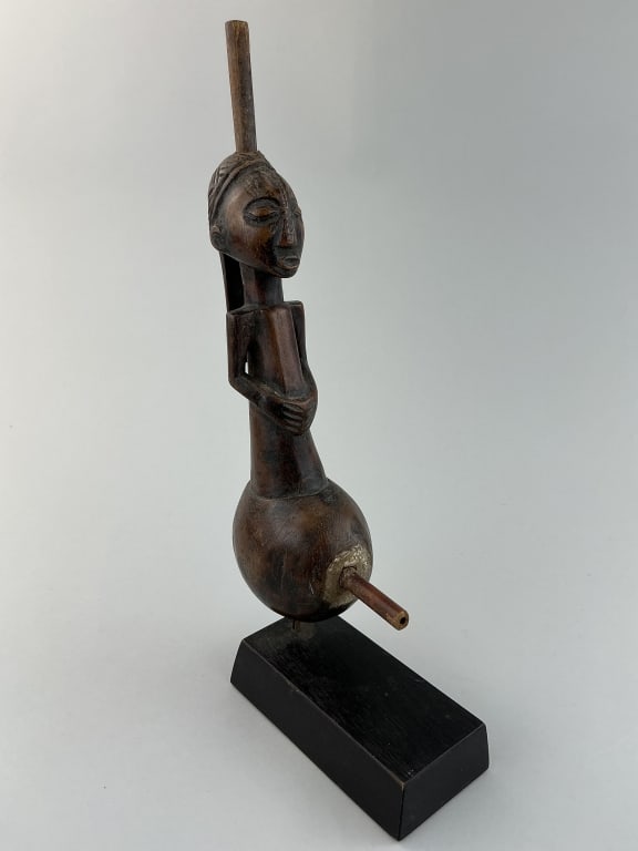 Antique Luba Carved Wood Figural Water Pipe.: Affixed to a display and measures approximately 13 inches high. Carved wooden pipe from the Luba people of the Dominican Republic of the Congo. Condition: good with wear, missing bowl.**LOCAL PICKUP M