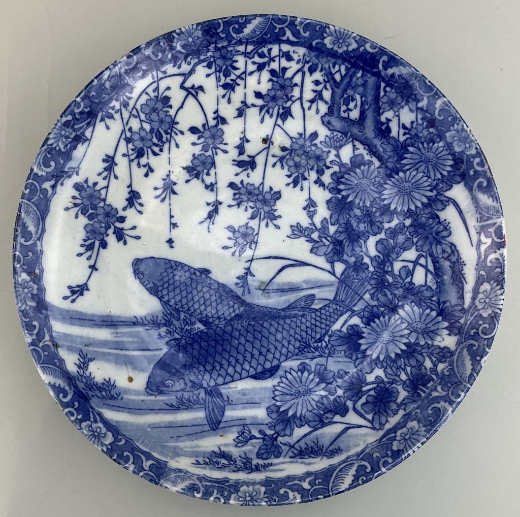 Antique Japanese Blue & White Porcelain Plate.: Measures 11 inches in diameter. Likely Meiji period (1868-1912), hand painted with koi fish in pond below cherry blossoms. Unsigned. Condition: Very good. **LOCAL PICKUP MUST BE BY APPT ONLY POSTAUCTI