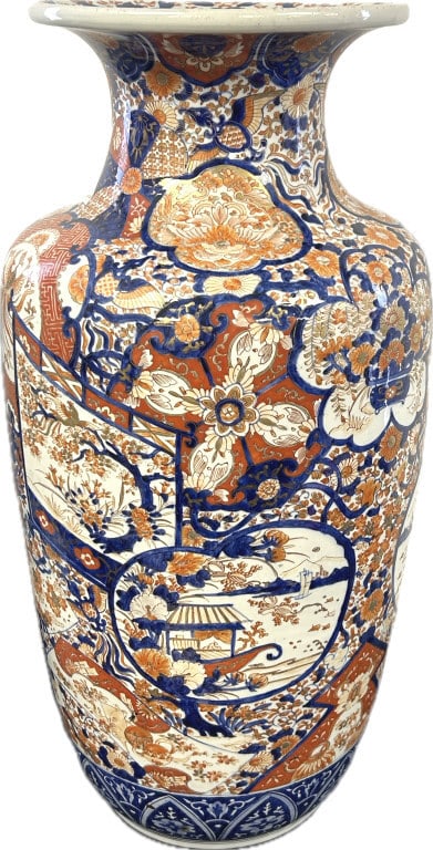Large Japanese Meiji Imari Porcelain Vase.: 15 inches wide x 30 inches tall. 19th century Imari porcelain large vase decorated with landscape, floral and bird motifs. Enameled in tones of iron-red, cobalt blue, and gold. Condition: Very good.**