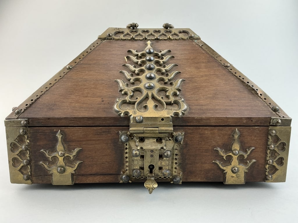 Antique Indian Kerala Wedding/Dowry Box.: Measures 12.75 inches wide. Late 19th century. Brass mounted rosewood with hinged pyramidal lid and an interior till. Known as a Malabar box, traditionally used by aristocratic woman and temples to st
