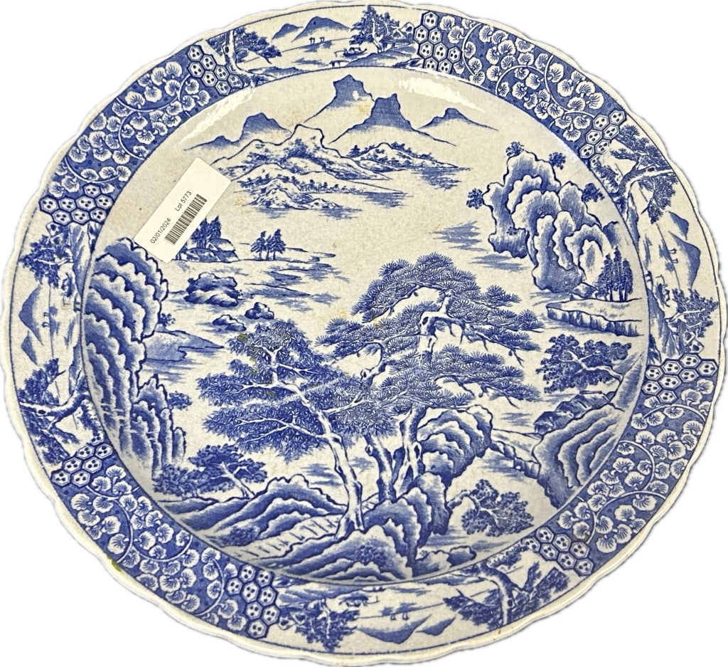 Japanese Blue & White Arita Porcelain Charger.: 16 inches diameter. Unsigned, likely Meiji period. Decorated with foliate landscapes and mountainous scenery. Condition: very good with light crazing. **LOCAL PICKUP MUST BE BY APPT ONLY POSTAUCTION O