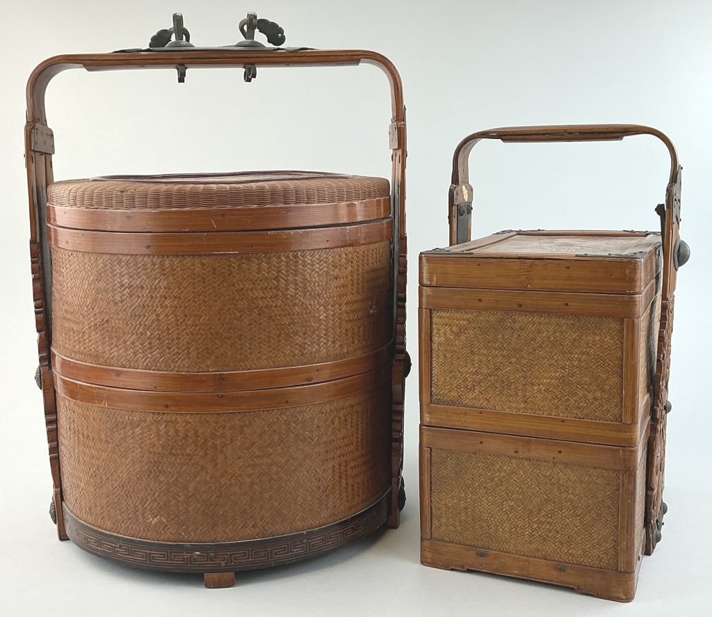 2 Antique Chinese Bamboo Wedding Baskets.: Measure 14 to17 inches high. Bamboo, wicker and rattan construction. Cylindrical basket has stag and phoenix incised decoration on lid. Rectangular basket has nobles and a mythical creature incised de