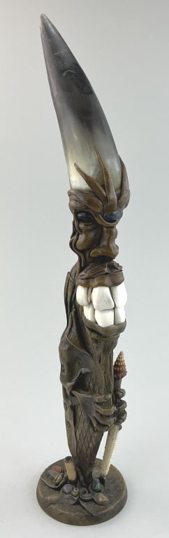 Vintage Decorative Evil Goblin Horn Dagger.: Measures 14 inches high. Also known as a troll knife, with curved horn blade, goblin-like figure with prominent teeth sculptured resin handle, mounted on a circular wood platform base. Condition: Very