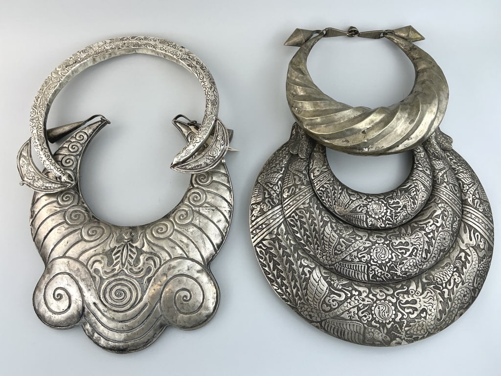 4 Antique/Vintage Silver Alloy Ceremonial Collars.: Largest piece measures 13.5 inches long. Chinese miao silver necklace with dragons, birds, fish hand-chased motifs. Hmong people of Southeast Asia bib style collar with hand-hammered scroll and reptil