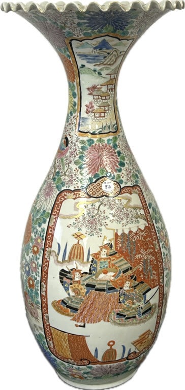 Antique Japanese Imari Porcelain Temple Vase.: 24 inches tall. Meiji period (1868-1912) large trumpet-form Hizen vase with ruffled rim, decorated with samurai cartouches on a chrysanthemum and peacock ground. Condition: Good with flake chips insid