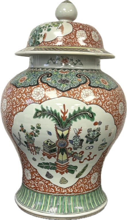 Chinese Qing Dynasty Famille Verte Temple Jar.: 13 inches wide x 22 inches tall. Late 19th/early 20th century porcelain bulbous form covered jar. Panels depict a phoenix among flowers and foliage on obverse and a vase surrounded by household items 