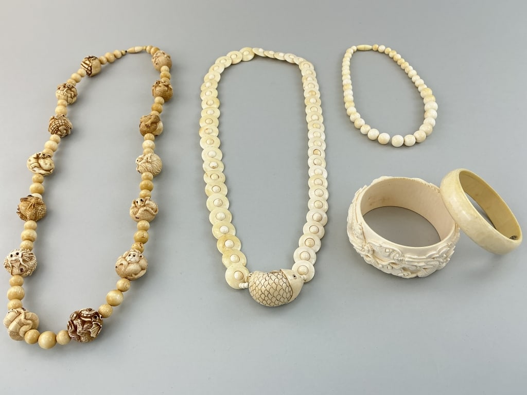 Vintage Chinese/Japanese Carved Bone Jewelry.: Fish necklace measures 14 inches from neck to front. Necklace with zodiac animals, necklace with disc-shaped links and carved fish pendant, necklace with graduated round bone beads, Chinese dragon car