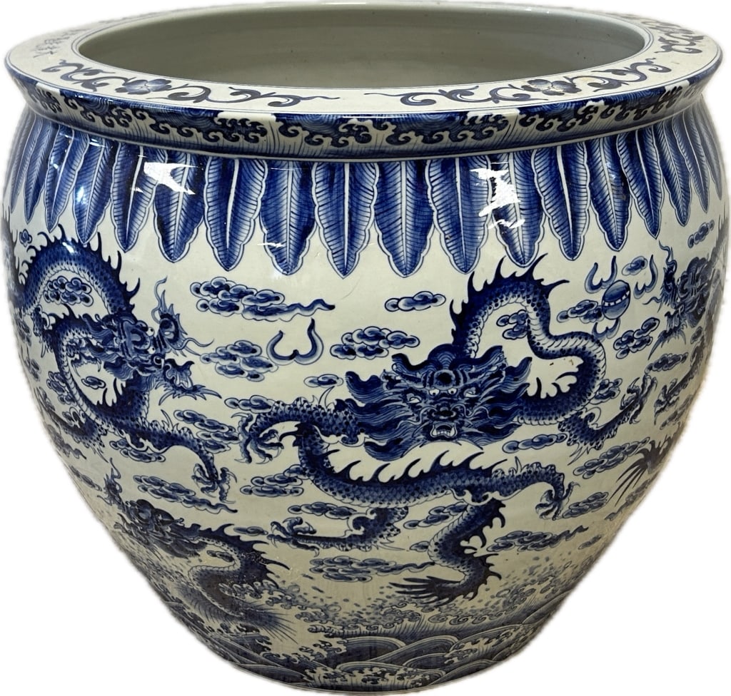 Chinese Blue & White Porcelain Jardiniere.: 21 inches wide x 18 inches tall. Approximately 50 lbs. Chinese Qianlong blue under-glaze six character mark on flat of upper rim which translates to Made during the Kangxi reign of the Great Qing. Und