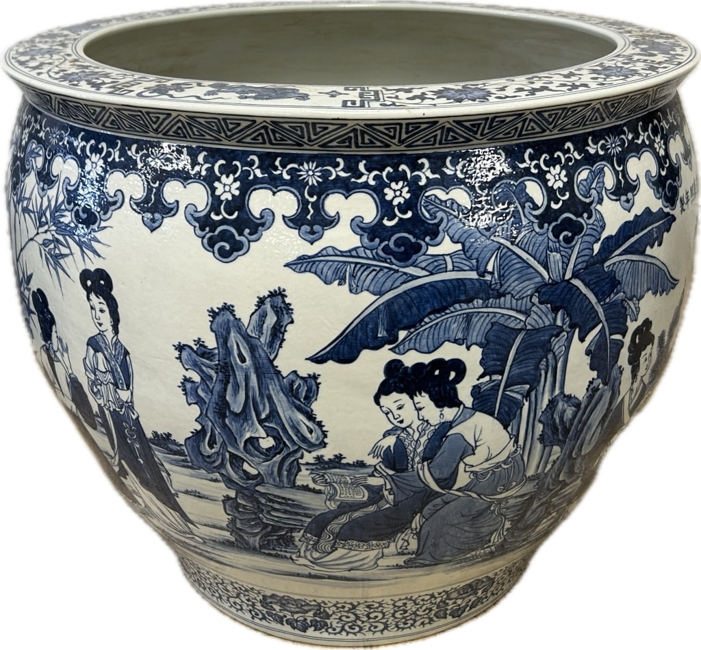 Chinese Blue & White Porcelain Jardiniere.: 21 inches wide x 18 inches tall. Approximately 50 lbs. Chinese Qianlong blue under-glaze six character mark on shoulder which translates to Made during the Kangxi reign of the Great Qing. Under-glaze 