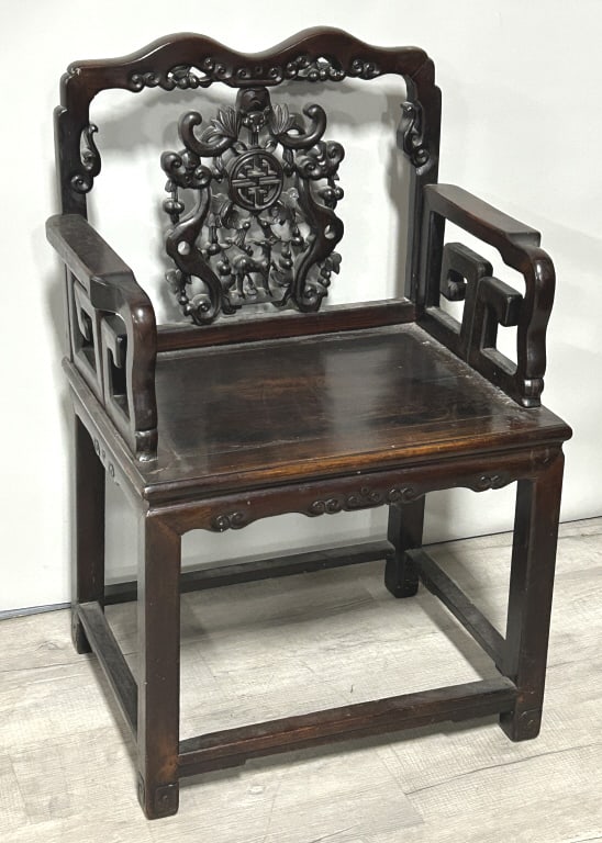 Antique Chinese Carved Rosewood Armchair.: 39 inches tall x 26 inches arm to arm. Approximately 30-40 lbs. Likely Meiji period (1868-1912). Features fretwork/medallion carvings, including a deer, fruit and foliate carved splat-back. Condition: