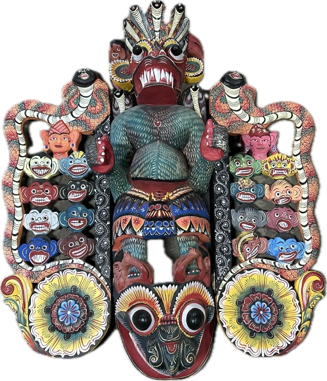 Sri Lankan Daha Ata Sanni Demon Mask.: 36 inches high x 34 inches wide. Formally known as Ceylon, an island country in South Asia. Also known as 18 Sanni mask, vibrantly polychrome painted and carved balsa wood (kaduru) mask. Traditionally