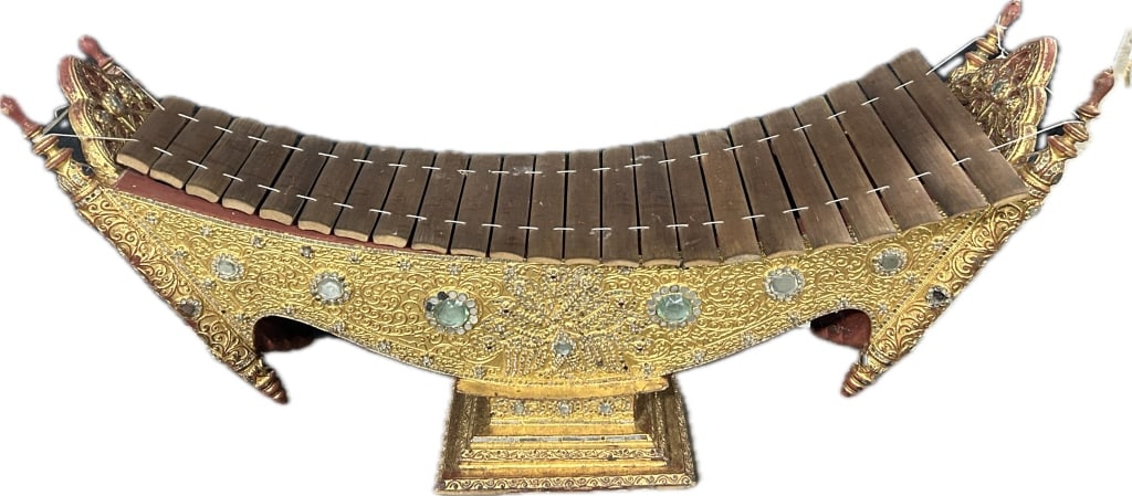 Antique/Vintage Tibetan Ranat ek Xylophone.: 56 inches long x 18 inches deep x 27 inches high. Known as a Rnat ek in Thailand or a Pattala in Myanmar (Burma). Carved wood boat-form xylophone with red and gilt paint, fitted with faceted glass jew