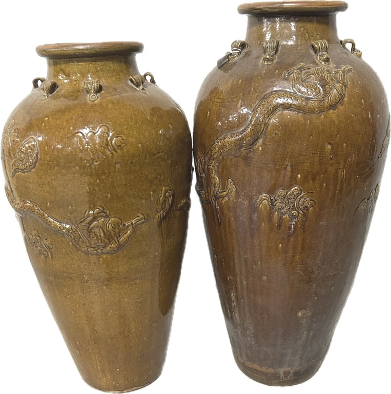 2 Antique Chinese Brown Glazed Martaban Jars.: Largest vase measures 16 inches wide x 36 inches tall. Smaller vase 33 inches tall. Burmese pottery Late Qing dynasty, each with rolled rims, shoulder with multiple ribbed lugs with foo dog heads (for