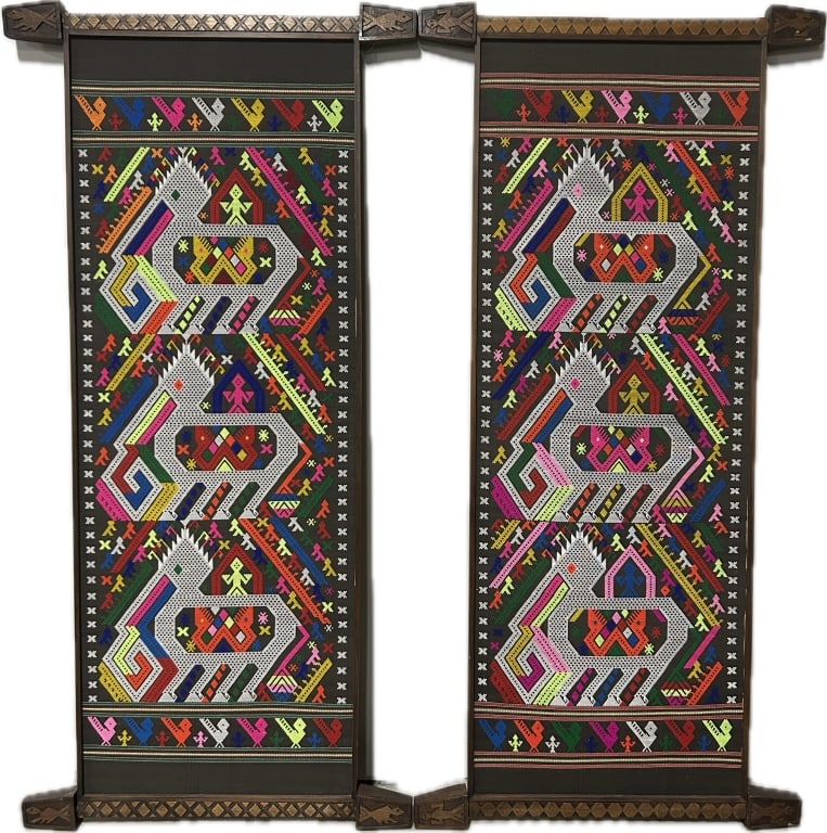 2 Vintage Chinese Tujia Brocade Wall Hangings.: Each measures 27 x 76 inches. Originating from the Western Hunan province, also known as Xilankapu. Vibrant colors with geometric designs, stylized elephant and figural motifs, animal carved wood trim