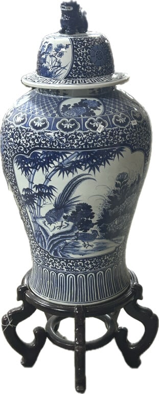 Antique Chinese Blue & White Porcelain Temple Jar.: Includes wooden base. Vase measures 17 inches wide x 30 inches tall. 19th century, with Chinoiserie exotic birds amongst bamboo and lush foliage. Foo dog finial on the dome lid. Includes wooden stand.